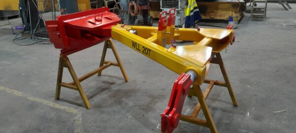 Heavy duty "A frame" shaped equipment to attach to underground loader for towing items up to 20 tonne weight. Couplings to allow oscillation in all directions.